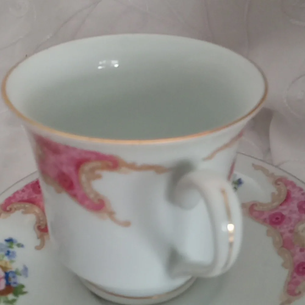 Two Beautiful Dainty Cups And Saucers